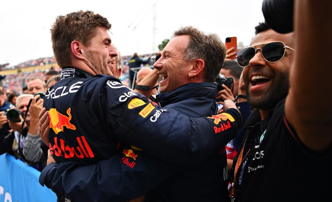 Verstappen is embraced by Red Bull boss Christian Horner after recovering strongly from qualifying a lowly 10th