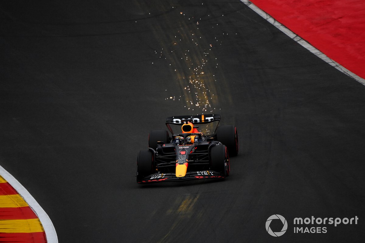 Max Verstappen, Red Bull Racing RB18, kicks up some sparks