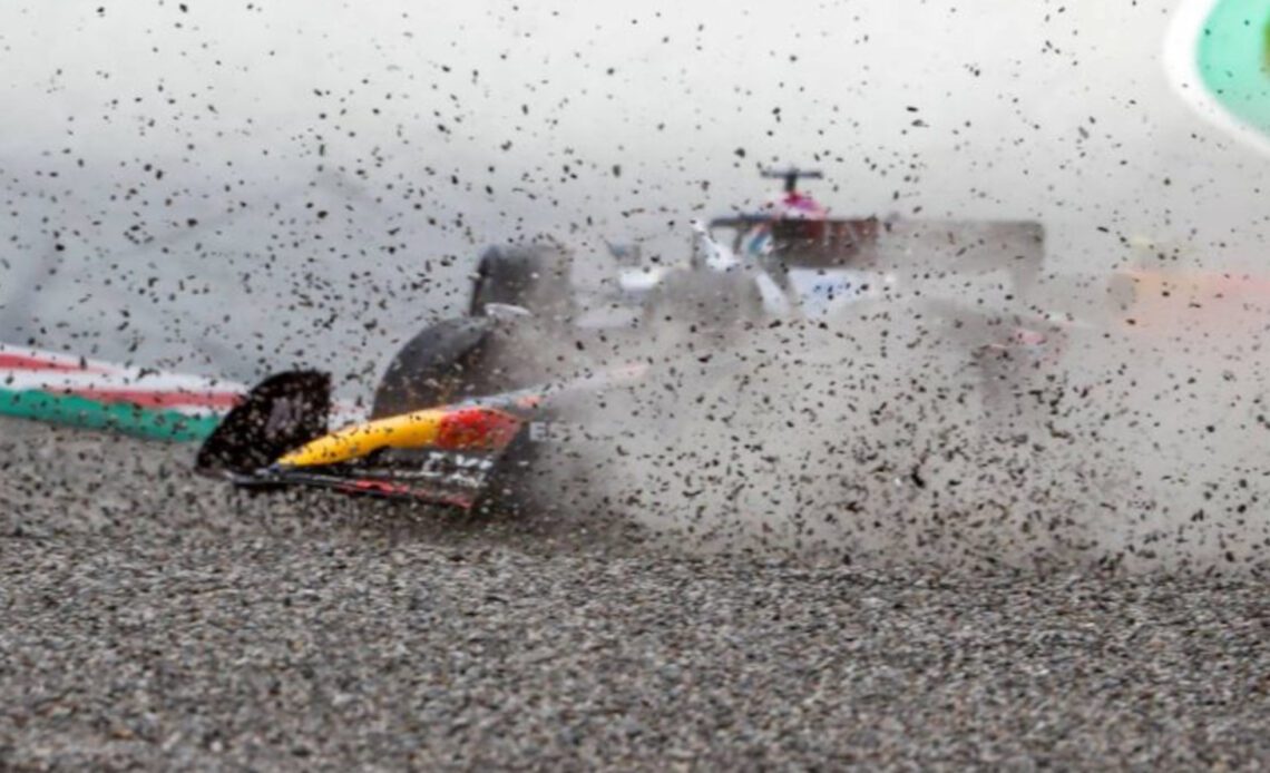 Sergio Perez in the gravel after contact with George Russell. Austria July 2022