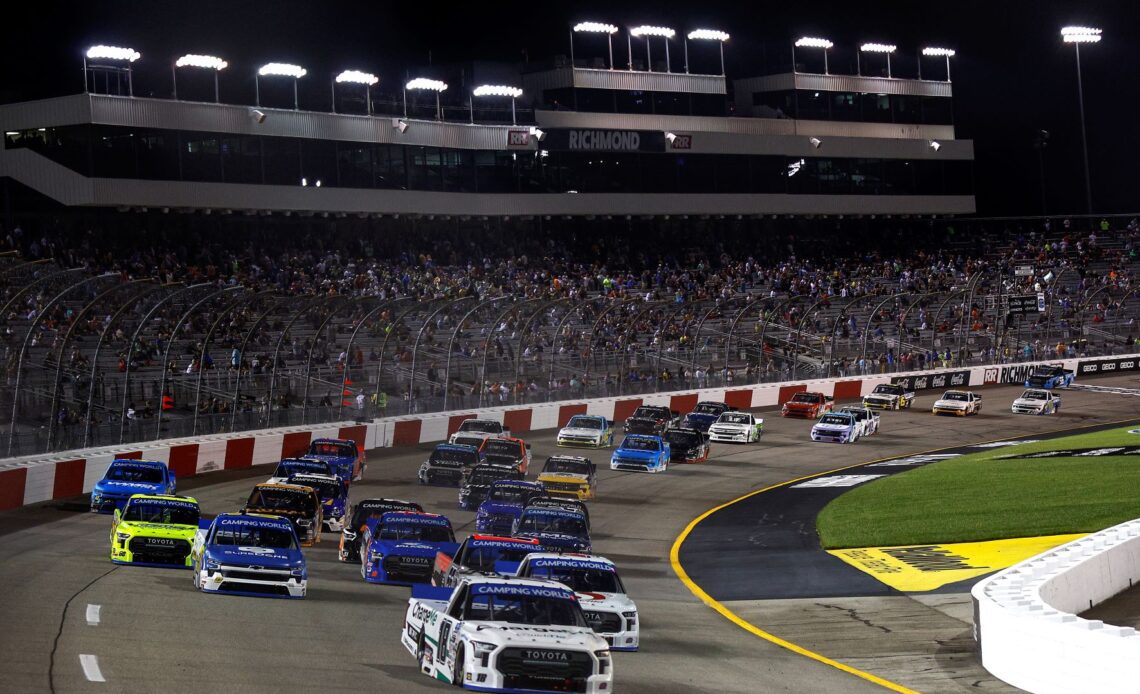 Chandler Smith, driver of the #18 Charge Me Toyota, leads the field during the NASCAR Camping World Truck Series Worldwide Express 250 for Carrier Appreciation at Richmond Raceway on August 13, 2022 in Richmond, Virginia. (Photo by Jared C. Tilton/Getty Images)