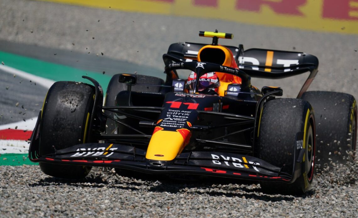 Sergio Perez, Red Bull Racing RB18 runs wide