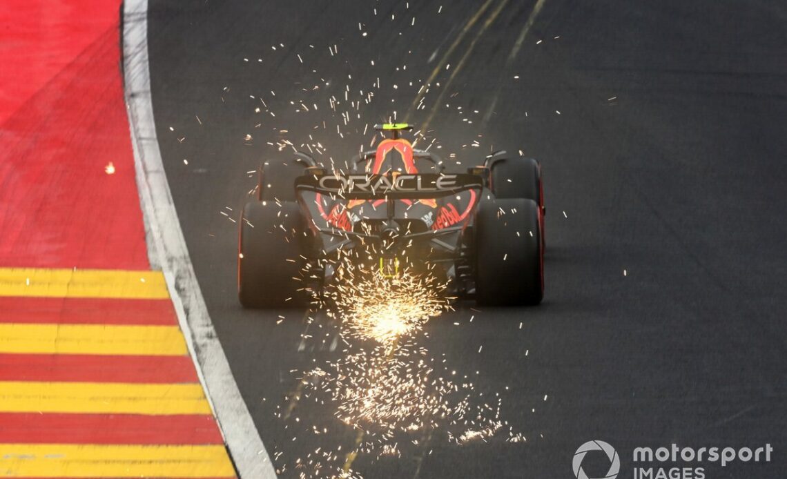 Sergio Perez, Red Bull Racing RB18, kicks up sparks