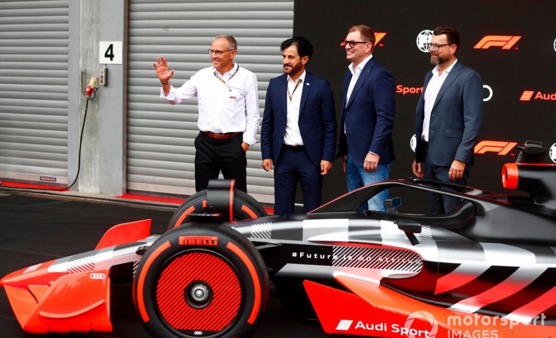Stefano Domenicali, CEO, Formula 1, with Mohammed bin Sulayem, President, FIA, Markus Duesmann, Chairman of the Board of Management of Audi AG, Oliver Hoffmann, Head of Technical Development at Audi Sport GmbH showcase the new Audi Sport F1 concept car