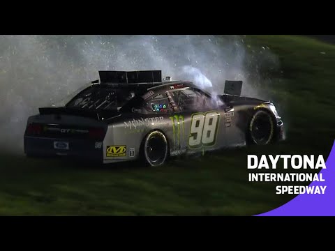 Herbst's spin sends him sliding across the grass at Daytona