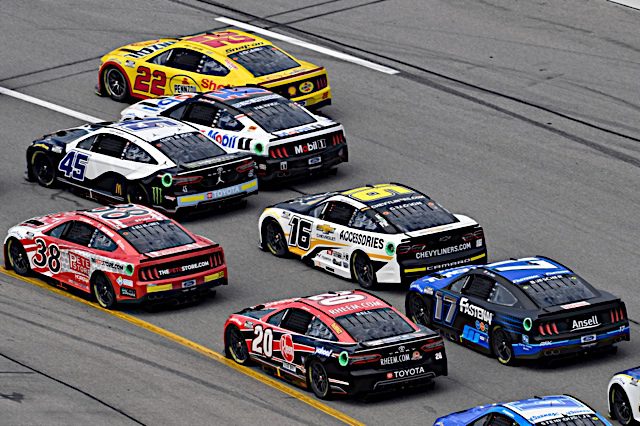 Joey Logano leads a pack of NASCAR drivers racing at Richmond in August 2022. (Photo: NKP)