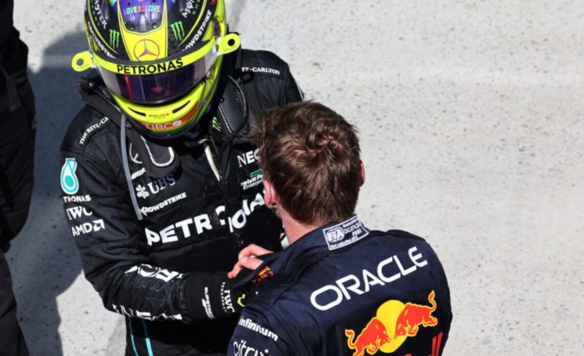 Lewis Hamilton shakes hands with race winner Max Verstappen in parc ferme. Canada June 2022