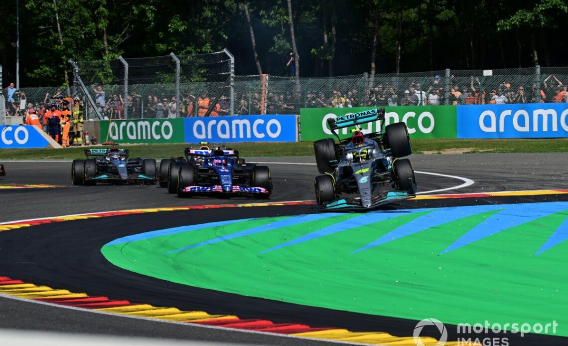 Fernando Alonso, Alpine A522, Lewis Hamilton, Mercedes W13, make contact on the opening lap