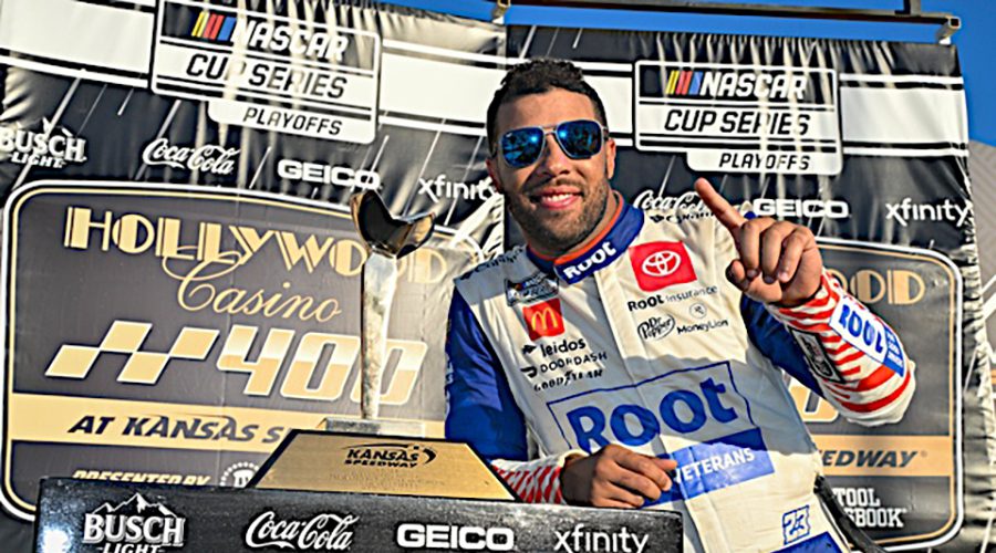 Bubba Wallace enjoys victory lane at Kansas Speedway. (Photo: NKP)