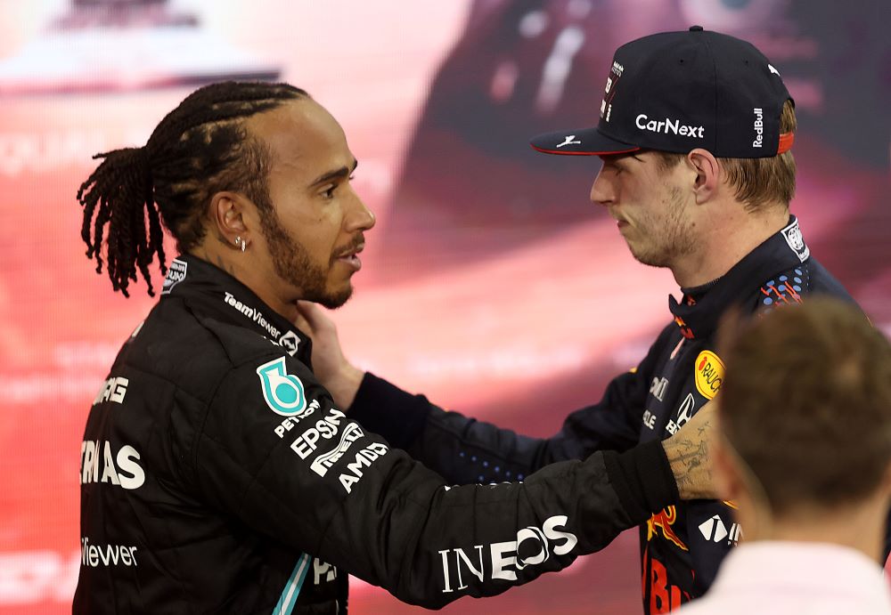 Formula 1's Lewis Hamilton congratulates Max Verstappen after 2021 Abu Dhabi Grand Prix, Lars Baron Getty Images