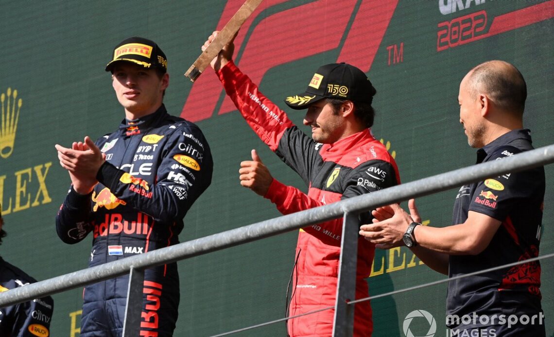 Carlos Sainz, Ferrari, 3rd position, lifts his trophy