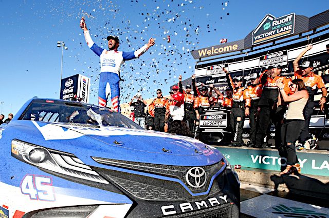 Bubba Wallace celebrates his win in the Hollywood Casino 400 at Kansas Speedway, September 2022. Photo: NKP