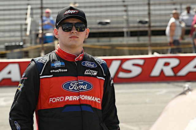 Taylor Gray, black and red firesuit, Ford Performance, black sunglasses and hat, NKP