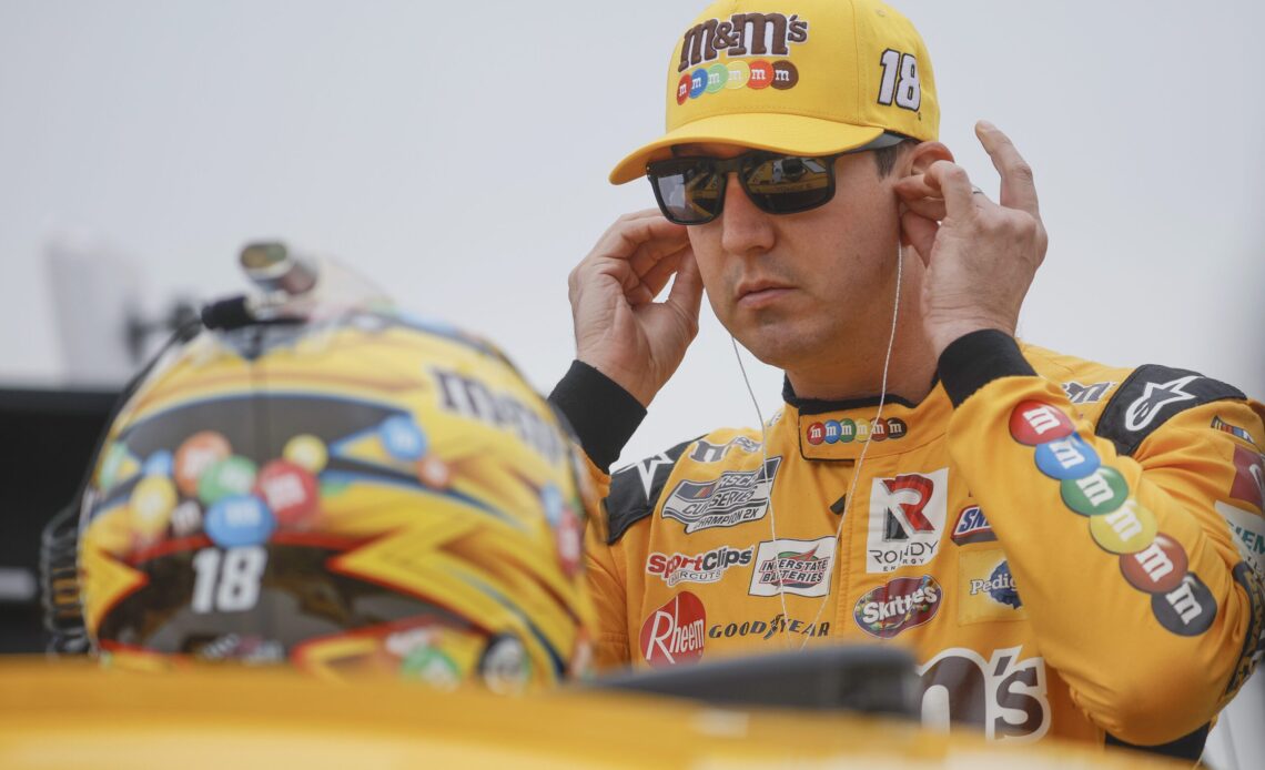 KANSAS CITY, KANSAS - SEPTEMBER 10: Kyle Busch, driver of the #18 M&M's Toyota, prepares to practice for the NASCAR Cup Series Hollywood Casino 400 at Kansas Speedway on September 10, 2022 in Kansas City, Kansas. (Photo by Chris Graythen/Getty Images)
