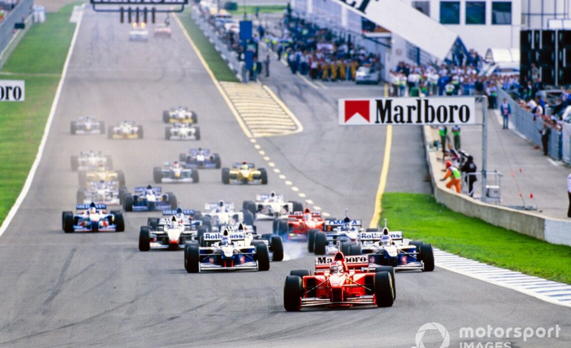 Schumacher aced the start as Williams team-mates Villenueve and Frentzen tripped over each other at Turn 1