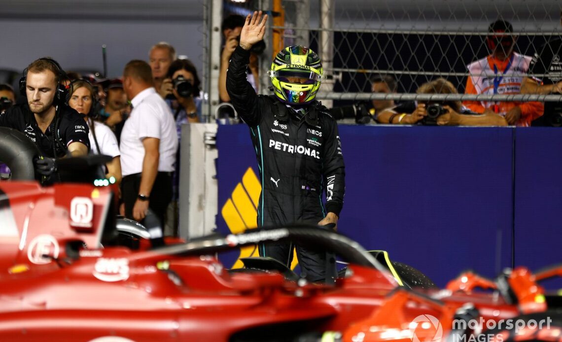 Lewis Hamilton, Mercedes AMG, waves from Parc Ferme after Qualifying