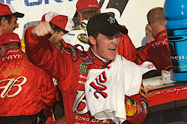 Dale Earnhardt Jr. celebrates a NASCAR Cup Series win at Talladega Superspeedway, 2004.