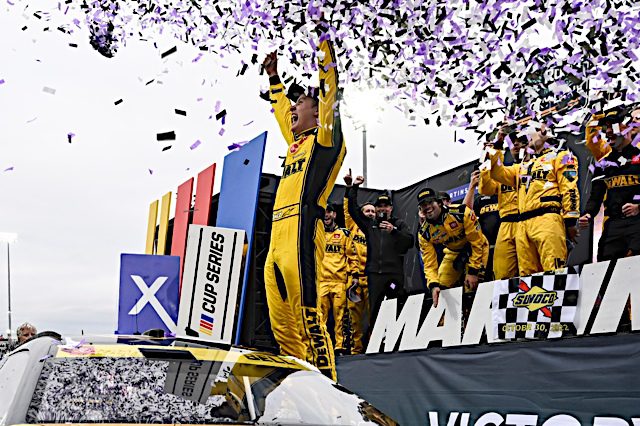 Christopher Bell celebrates his NASCAR Cup Series win at Martinsville Speedway, October 2022. Photo: NKP