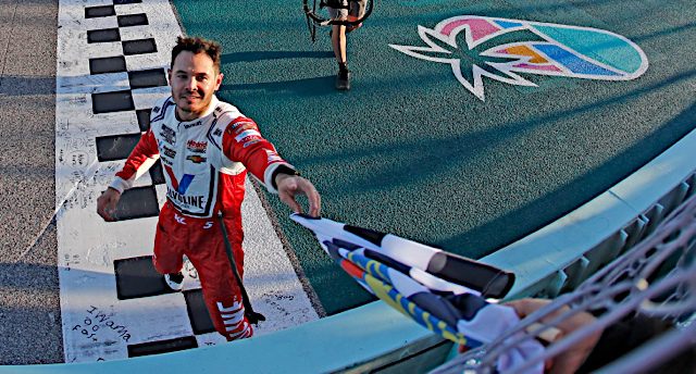 Kyle Larson celebrates a NASCAR Cup Series win at Homestead-Miami Speedway, October 2022.