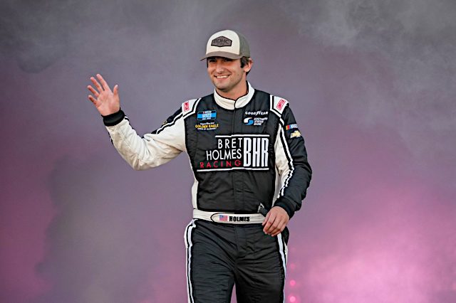 Bret Holmes waves in driver introductions before the NASCAR Camping World Truck Series race at Richmond, NKP