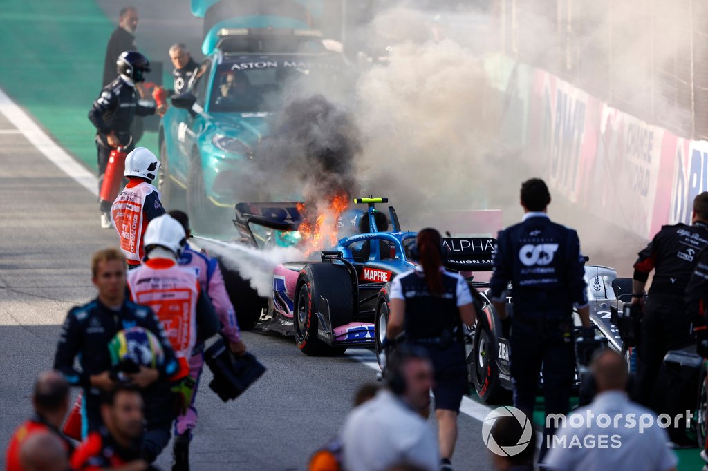 Ocon's car caught fire in parc ferme after damage to the sidepod caused from their first lap contact at Turn 4