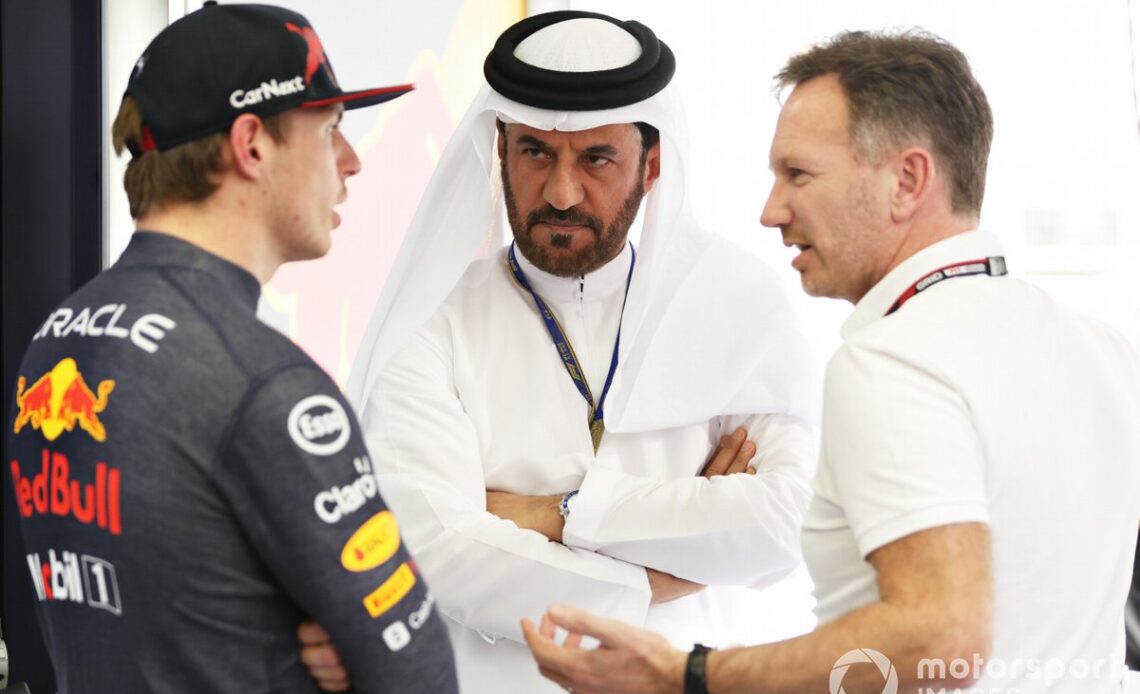 Mohammed ben Sulayem, FIA President, talks with Red Bull Racing Team Principal Christian Horner and Max Verstappen of Red Bull Racing