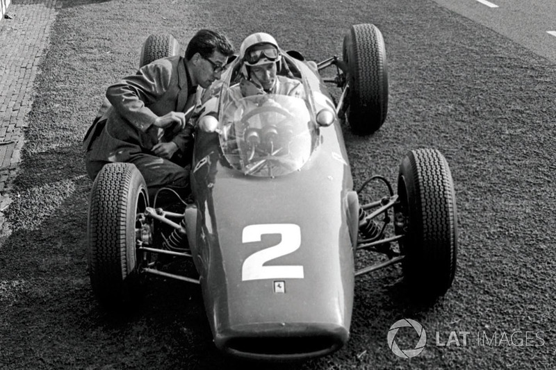 Forghieri exchanges notes with Surtees, pictured here in the Ferrari 156. He took its successor, the 158, to the 1964 world title