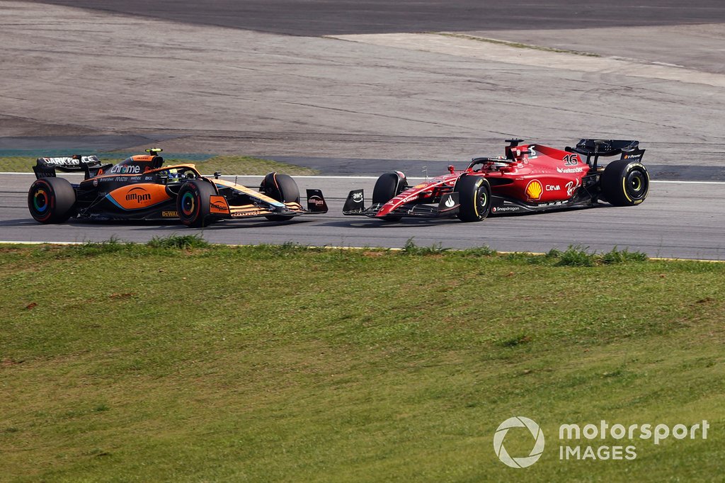 Lando Norris, McLaren MCL36, Charles Leclerc, Ferrari F1-75, collide, resulting in a spin