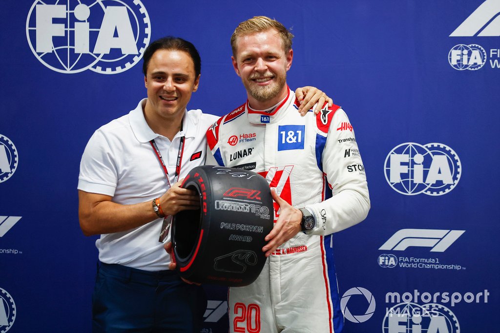 Kevin Magnussen, Haas F1 Team, receives his Pirelli Pole Position award from Felipe Massa