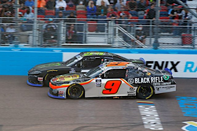 2022 Xfinity Phoenix II side-by-side racing II Ty Gibbs, No. 54 Joe Gibbs Racing Toyota, and Noah Gragson, No. 9 JR Motorsports Chevrolet (Credit: NKP)