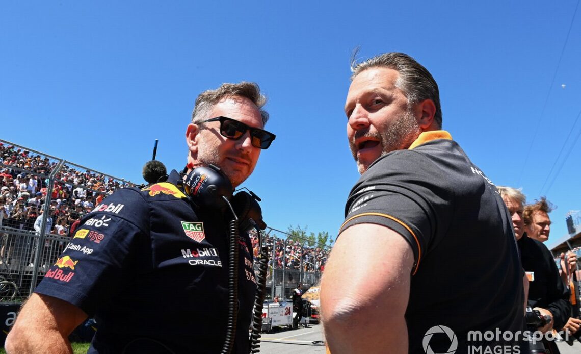 Christian Horner, Team Principal, Red Bull Racing, Zak Brown, CEO, McLaren Racing, on the grid
