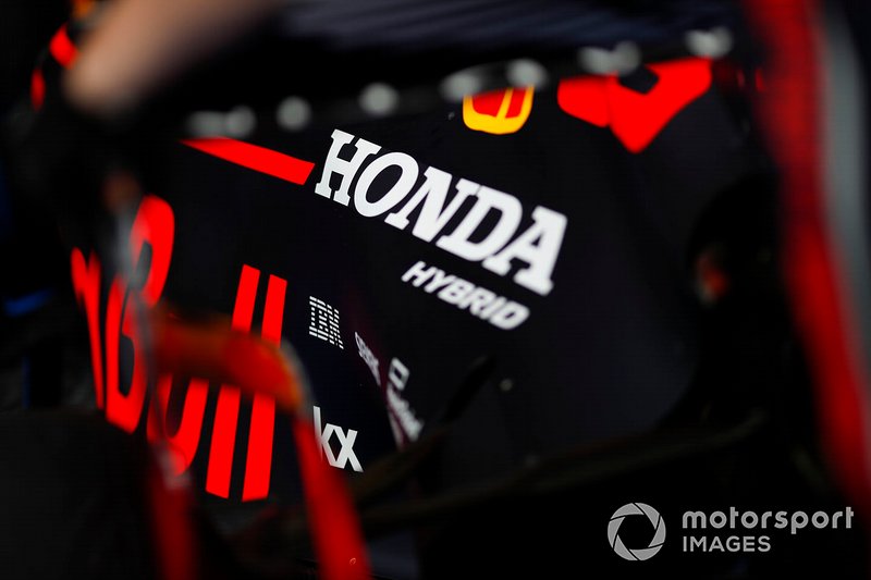 A Honda logo on a Red Bull engine cover