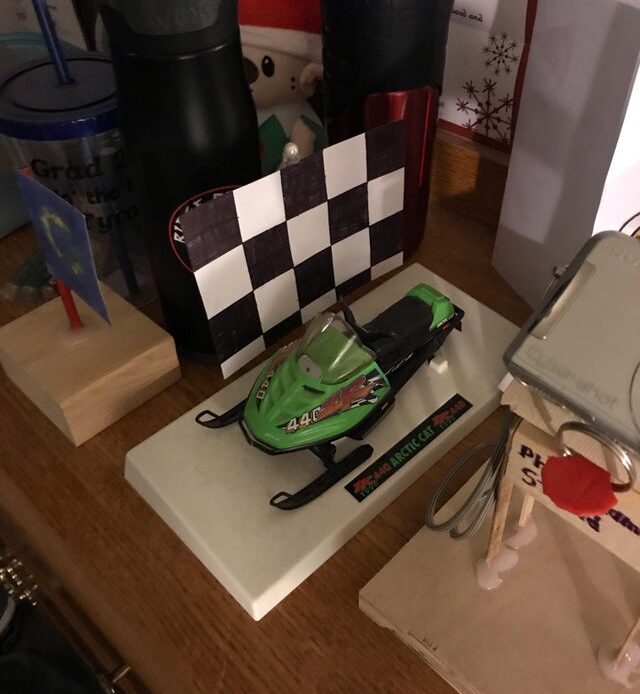 I made this Black and White Checkered Flag that I made at Home on my Snowmobile Stand.