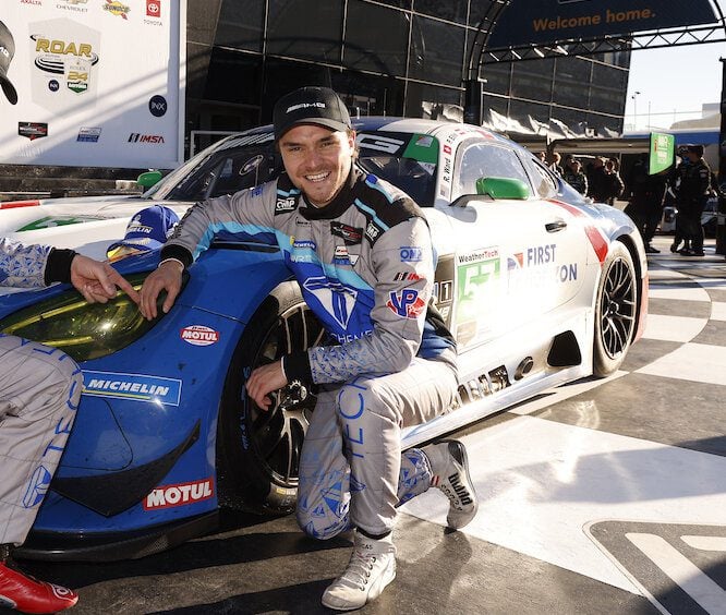 Lucas Auer celebrates after winning the GTD pole for the Rolex 24 at Daytona, 1/23/2022 (Photo: Courtesy of IMSA)