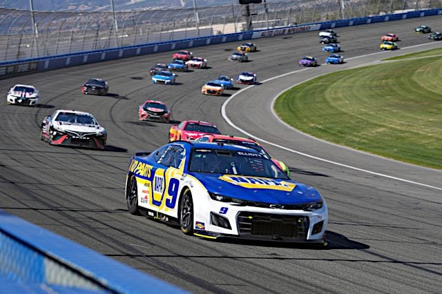 Chase Elliott leads a pack of NASCAR race cars at Auto Club Speedway, February 2022. Photo: NKP