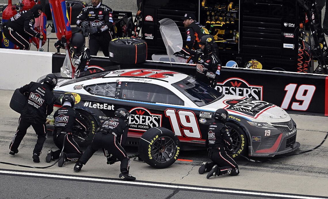 NASCAR suspends two JGR crew members after Truex loose wheel