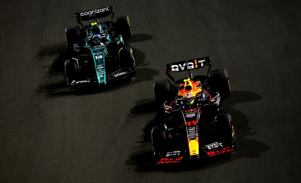 Sergio Perez, Red Bull Racing RB19, Fernando Alonso, Aston Martin AMR23