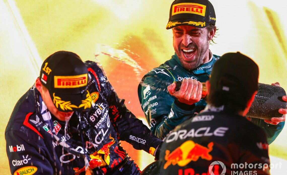 Max Verstappen, Red Bull Racing, 1st position, Fernando Alonso, Aston Martin F1 Team, 3rd position, Sergio Perez, Red Bull Racing, 2nd position, celebrate on the podium