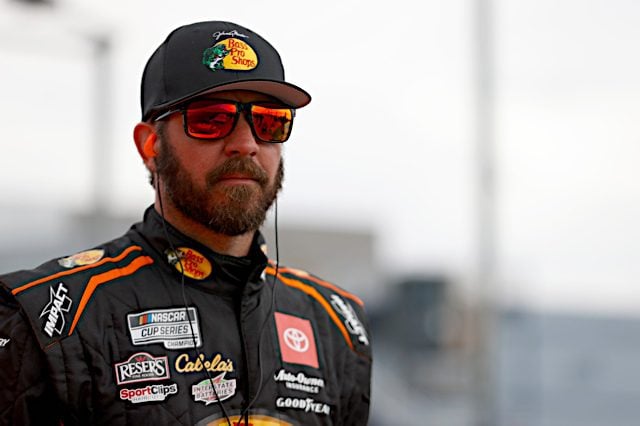 Martin Truex Jr. wearing sunglasses and a hat, NKP