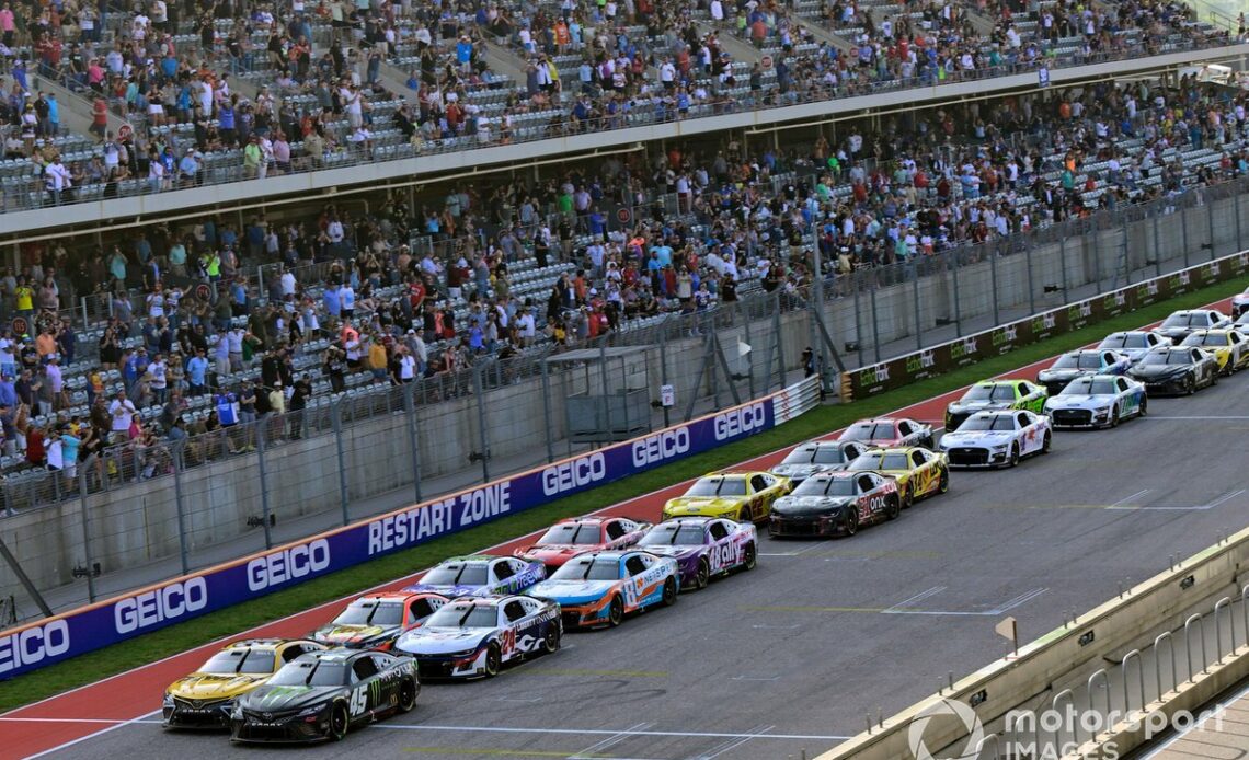 Drivers line up at COTA in the restart zone