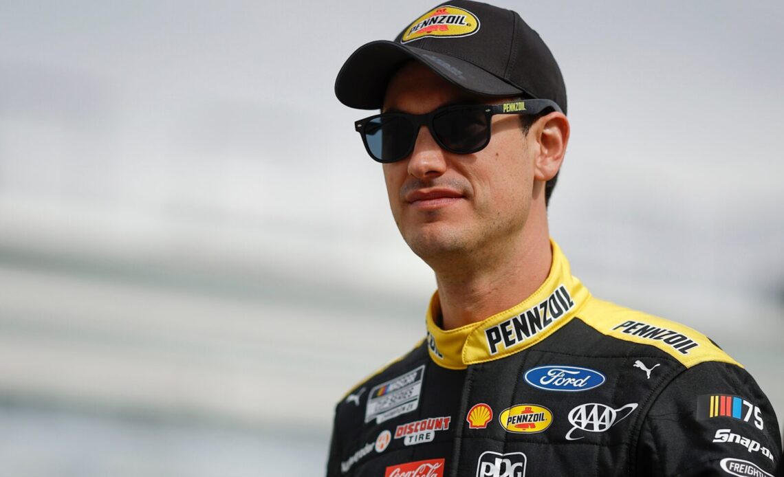 Joey Logano, driver of the #22 Pennzoil Ford, walks the grid during practice for the NASCAR Cup Series Pennzoil 400 at Las Vegas Motor Speedway on March 04, 2023 in Las Vegas, Nevada. (Photo by Chris Graythen/Getty Images)