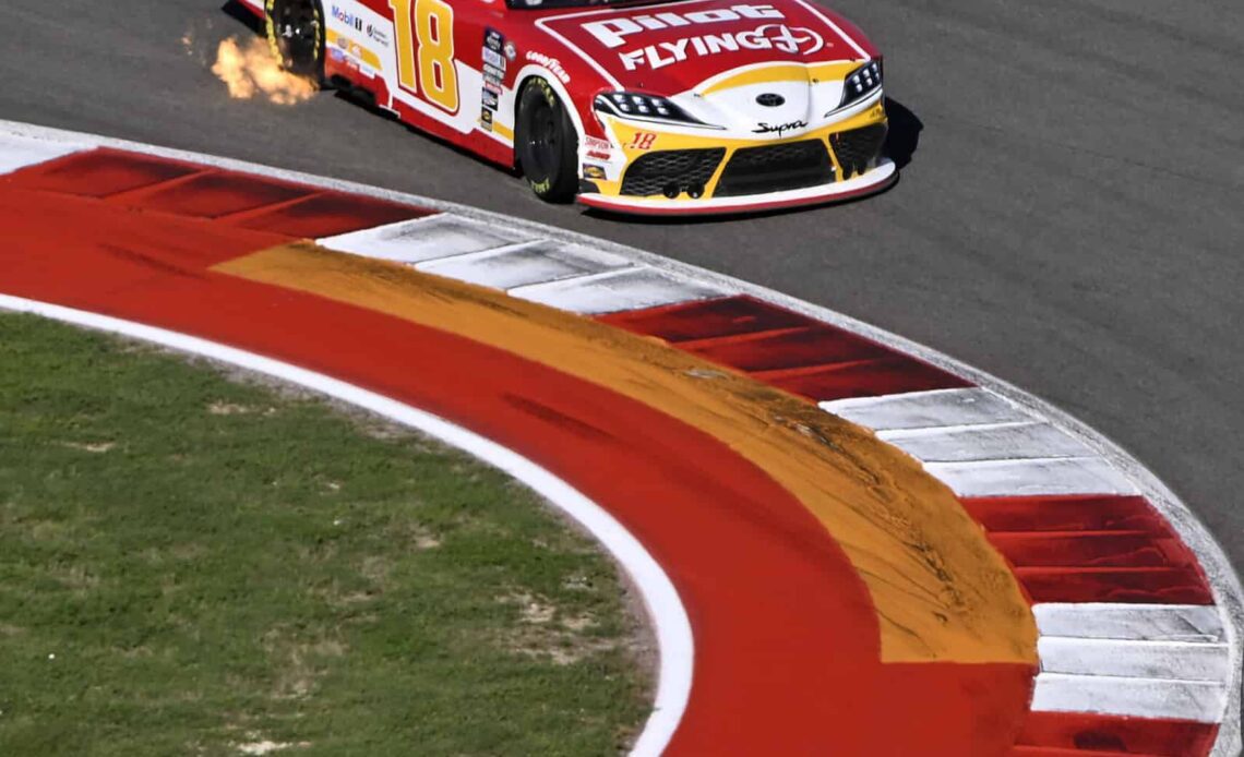 Sam Mayer, driver of the #1 Accelerate Pros Talent Chevrolet, and Sammy Smith, driver of the #18 Pilot Flying J Toyota, race during the NASCAR Xfinity Series Pit Boss 250 at Circuit of The Americas on March 25, 2023 in Austin, Texas. (Photo by Logan Riely/Getty Images)