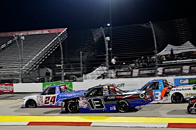 2023 Martinsville 1 Trucks - Rajah Caruth, No. 24 GMS Racing Chevrolet, and Hailie Deegan, No. 13 ThorSport Racing Ford, pack racing (Credit: NKP)