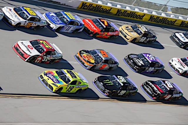 NASCAR Xfinity Series cars ride in a pack at the high banks of Talladega Superspeedway, NKP