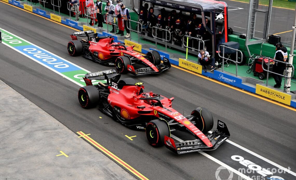 Carlos Sainz, Ferrari SF-23, Charles Leclerc, Ferrari SF-23, leave the garage