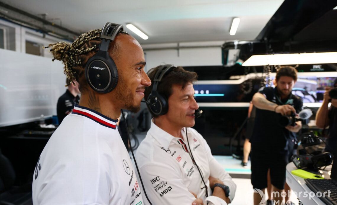 Lewis Hamilton, Mercedes-AMG, watches on with Toto Wolff, Team Principal and CEO, Mercedes AMG