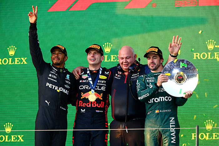 F1 Grand Prix of Australia MELBOURNE, AUSTRALIA - APRIL 02: Race winner Max Verstappen of the Netherlands and Oracle Red Bull Racing (second from left), Second placed Lewis Hamilton of Great Britain and Mercedes (L), Third placed Fernando Alonso of Spain and Aston Martin F1 Team (R) and Rob Marshall, the Chief Engineering Officer of Red Bull Racing (second from right) celebrate on the podium during the F1 Grand Prix of Australia at Albert Park Grand Prix Circuit on April 02, 2023 in Melbourne, Australia. (Photo by Quinn Rooney/Getty Images) // Getty Images / Red Bull Content Pool // SI202304020193 // Usage for editorial use only // F1, Verstappen, Lewis Hamilton, Fernando Alonso, podium
