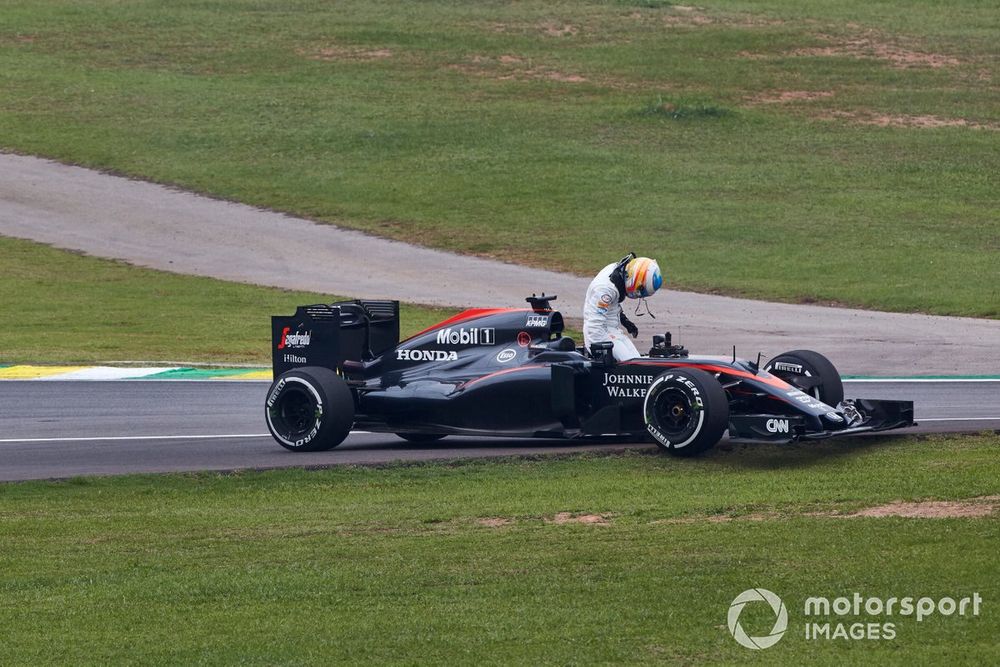 Fernando Alonso, McLaren MP4-30 Honda, pulls off the track with engine problems
