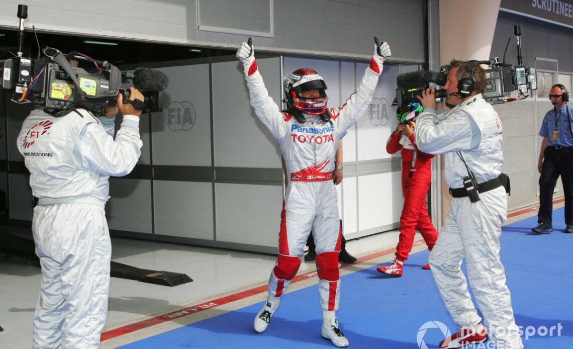 Jarno Trulli, Toyota celebrates his pole position in parc ferme