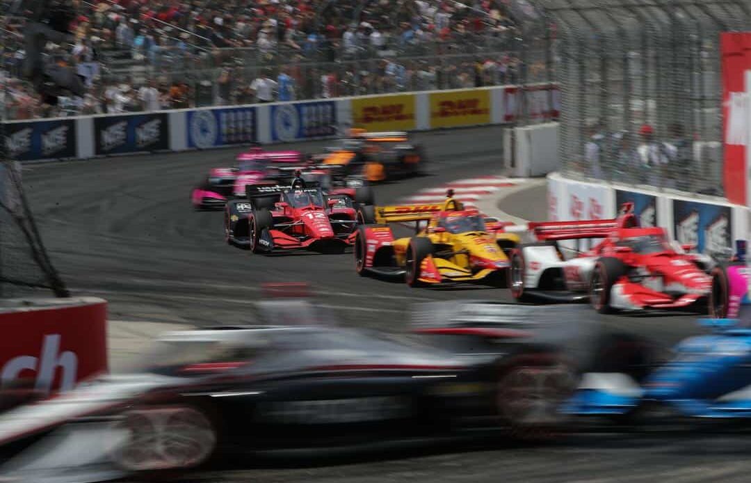 Marcus Ericsson, No. 8 Chip Ganassi Racing Honda, Romain Grosjean, No. 28 Andretti Autosport Honda and Will Power, No. 12 Team Penske Chevrolet, enter the final hairpin at the 2022 Acura Grand Prix of Long Beach.