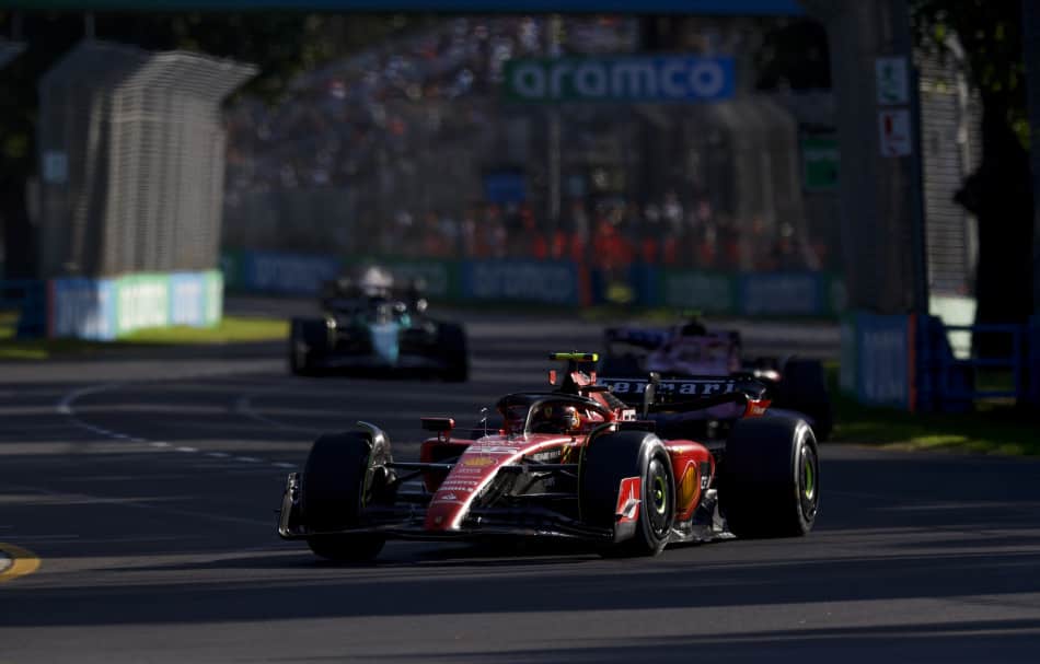 Carlos Sainz (No. 55, Scuderia Ferrari) racing in the midfield in the 2023 Rolex Australian Grand Prix